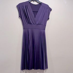 Soprano purple Dress with pleaded skirt. 
Size Small